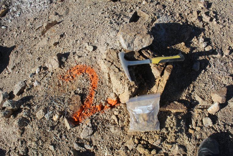 Orange iron oxide and green copper on one sample, bag for scale