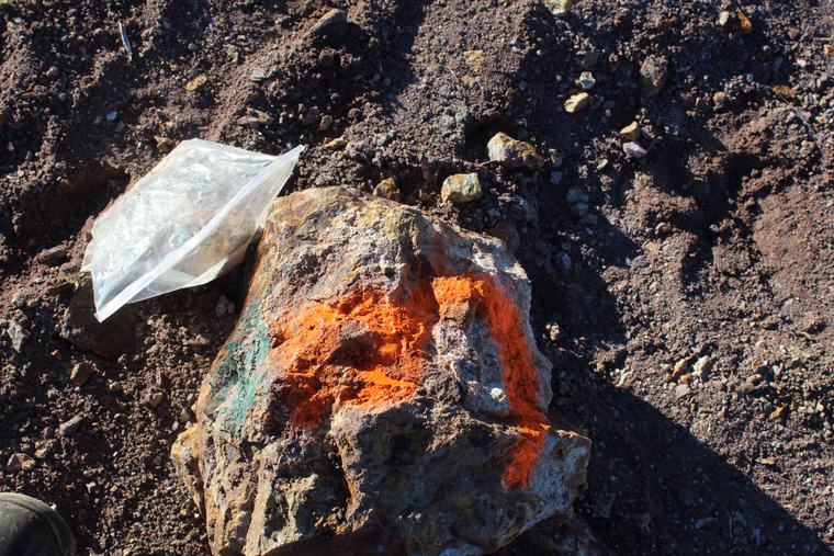Vivid blue and green copper staining across fractured surfaces
