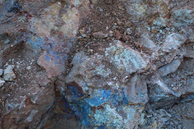 Dense blue-green copper mineral coating a fracture face