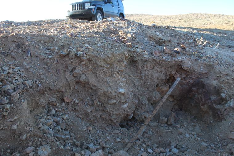 Historic shaft opening in context on the slope