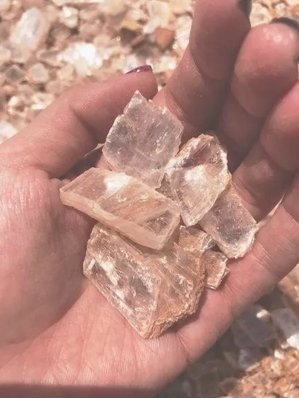 Calcite crystals in hand