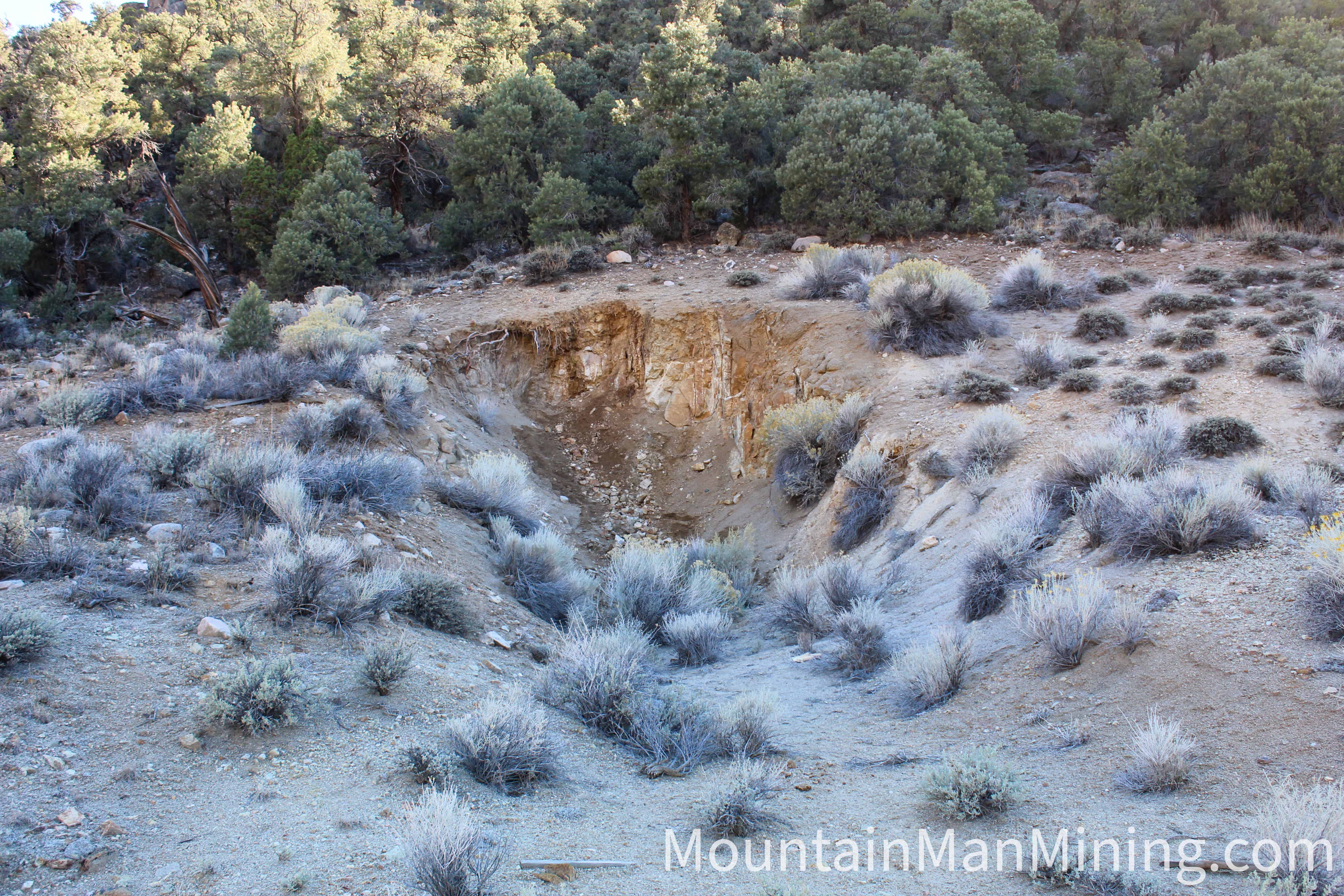 The Enriquez &mdash; The shaft collar in light-colored quartz monzonite