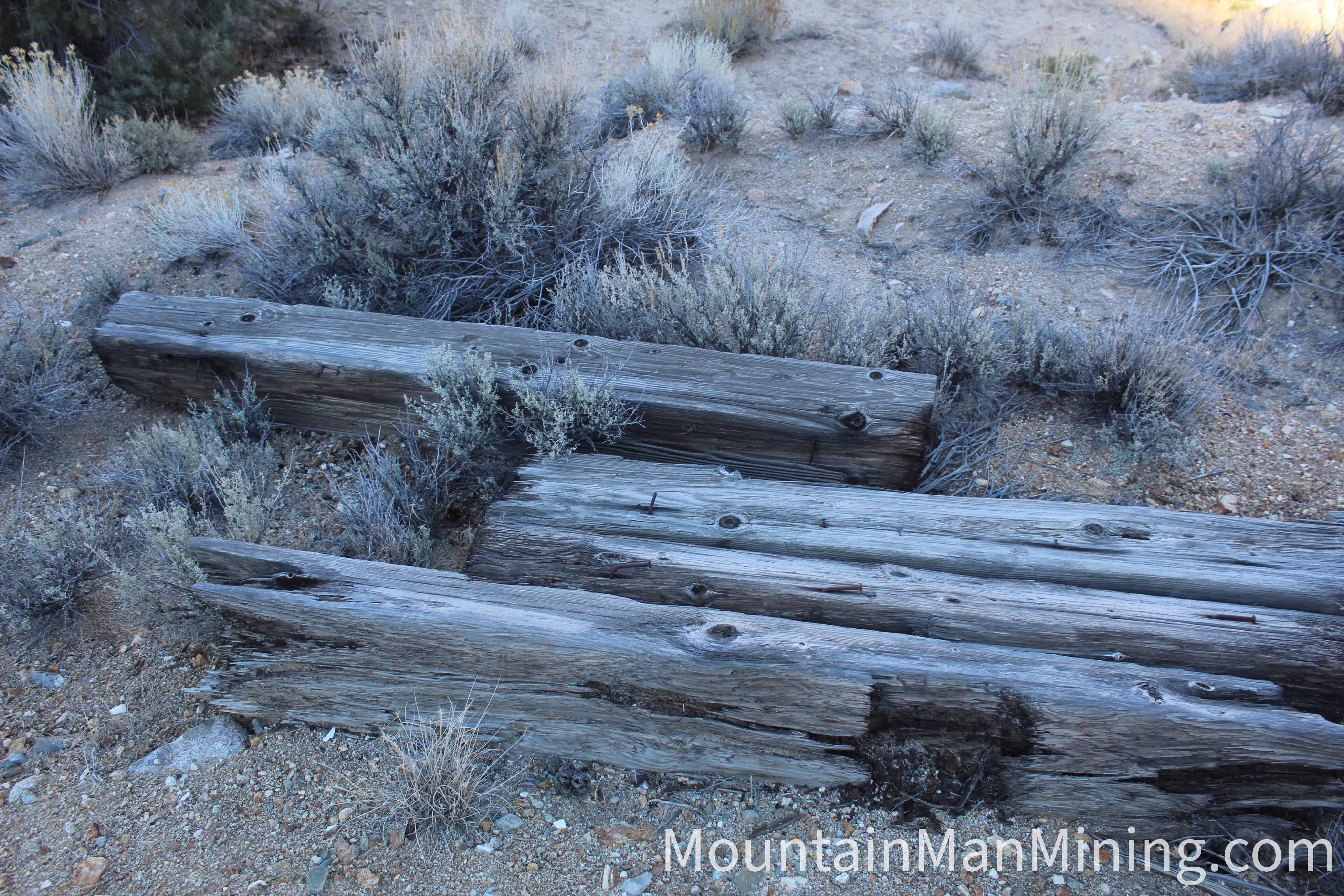 The Enriquez &mdash; Old timbers and dump material at the workings