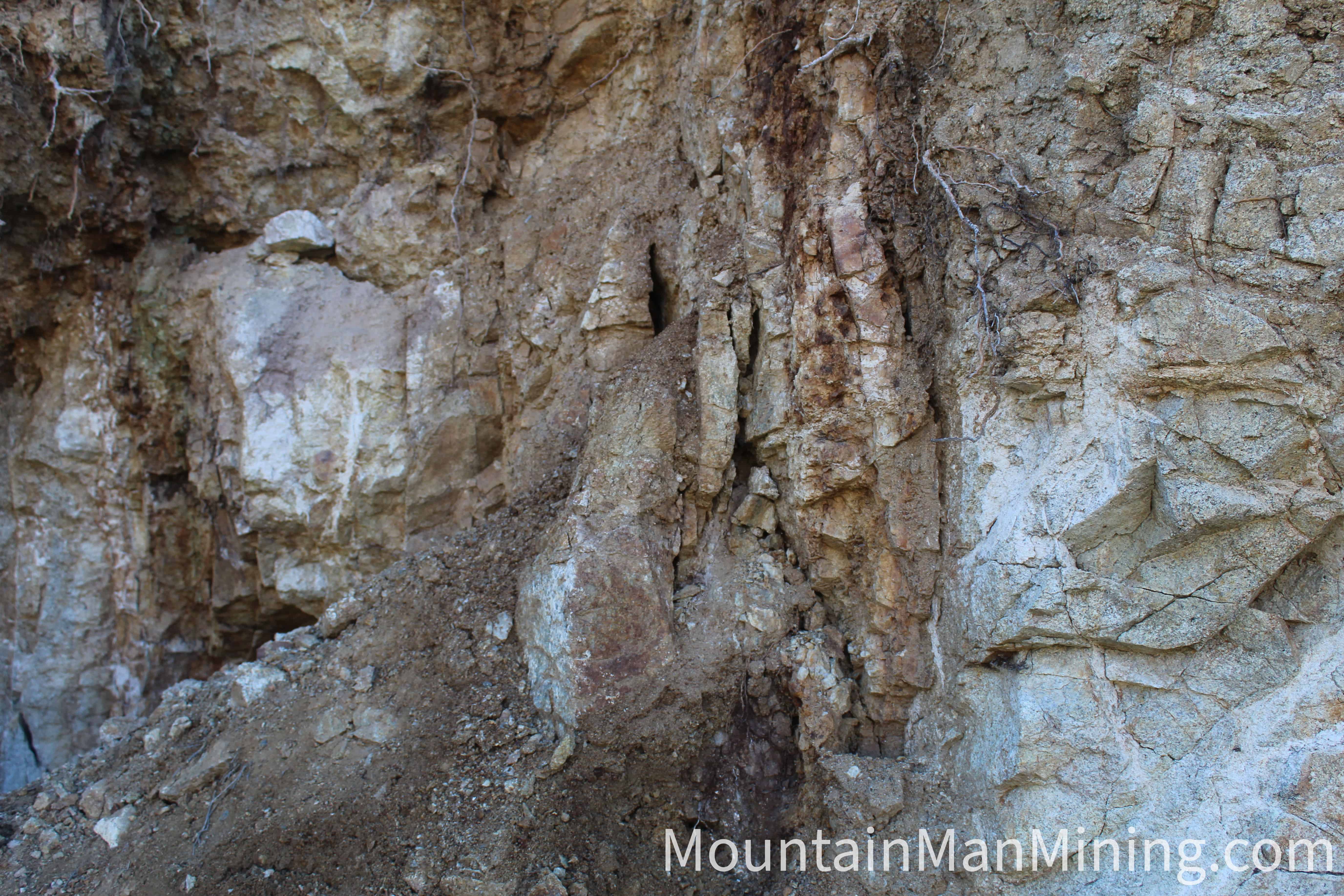 The Enriquez &mdash; Iron-stained vein quartz in the outcrop